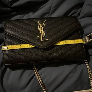 YSL black leather clutch